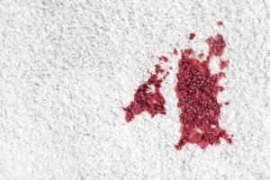 Blutflecken auf dem Teppich